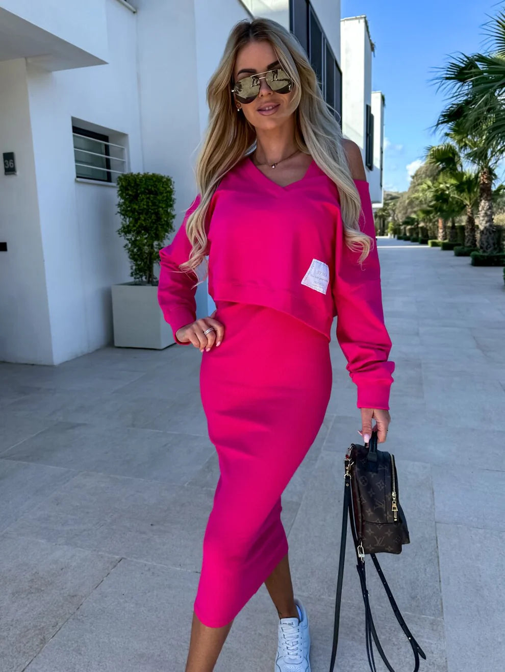 SARA - Elegante conjunto de dos piezas con top corto y falda midi acanalada