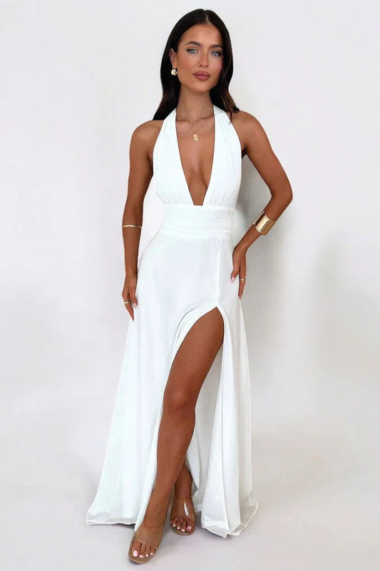 MARTA - Elegante vestido largo con escote halter y abertura alta
